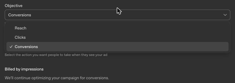 OpenAI's ChatGPT Ads Manager campaign setup with the objective menu open, showing Reach, Clicks and Conversions, and Billed by impressions below.